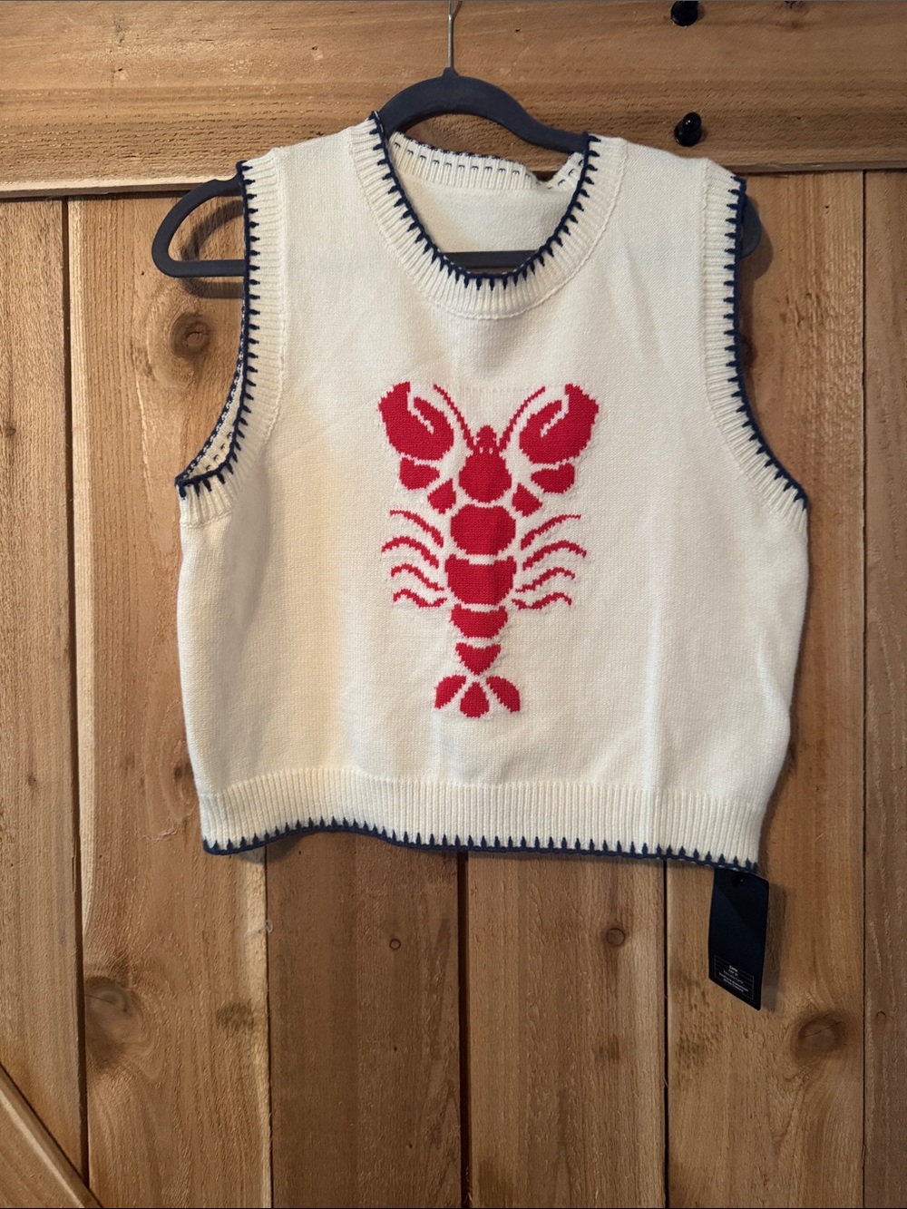 Cream Sleeveless Knit sweater vest with Red Lobster Motif